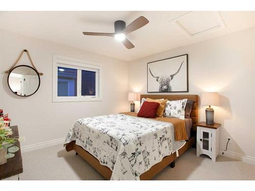 1149 Coopers Drive Sw, Airdrie, AB - Indoor Photo Showing Bedroom