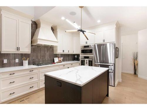 1149 Coopers Drive Sw, Airdrie, AB - Indoor Photo Showing Kitchen With Stainless Steel Kitchen