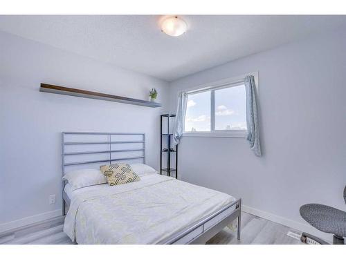 6 Tararidge Drive Ne, Calgary, AB - Indoor Photo Showing Bedroom