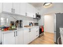 4209 Bow Trail Sw, Calgary, AB  - Indoor Photo Showing Kitchen With Upgraded Kitchen 