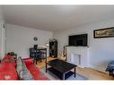 654 27 Avenue Nw, Calgary, AB  - Indoor Photo Showing Living Room 