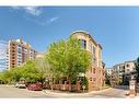 402-650 Eau Claire Avenue Sw, Calgary, AB  - Outdoor With Facade 