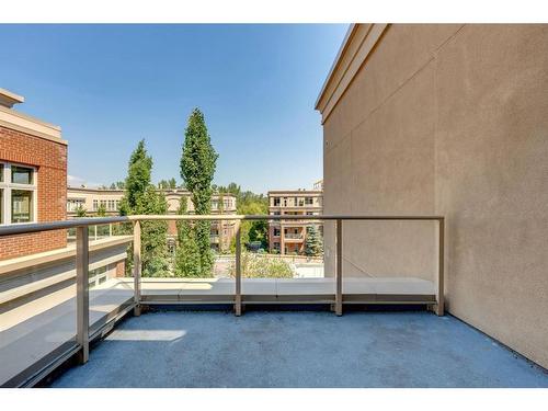 402-650 Eau Claire Avenue Sw, Calgary, AB - Outdoor With Balcony With Exterior