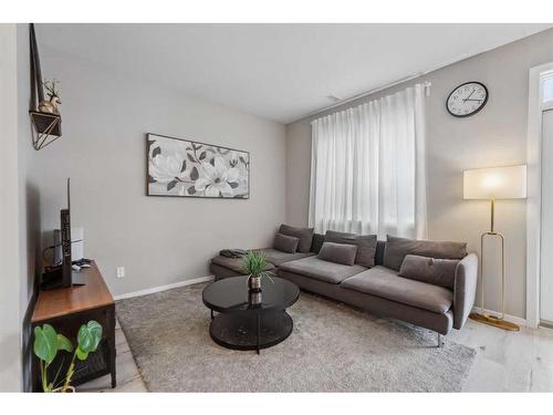 204-365 Redstone Walk Ne, Calgary, AB - Indoor Photo Showing Living Room