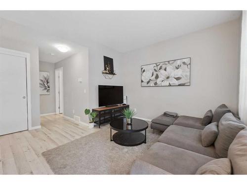 204-365 Redstone Walk Ne, Calgary, AB - Indoor Photo Showing Living Room