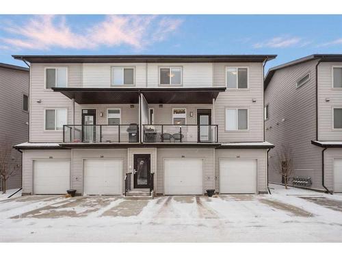 204-365 Redstone Walk Ne, Calgary, AB - Outdoor With Balcony With Facade