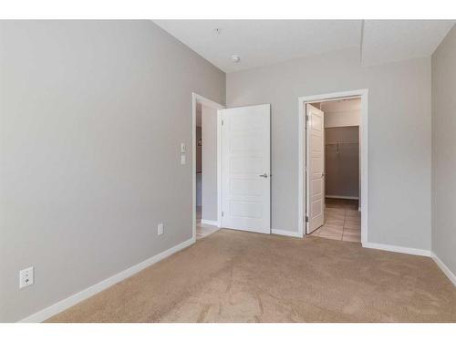 102-4350 Seton Drive Se, Calgary, AB - Indoor Photo Showing Other Room