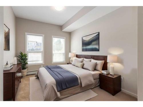 102-4350 Seton Drive Se, Calgary, AB - Indoor Photo Showing Bedroom