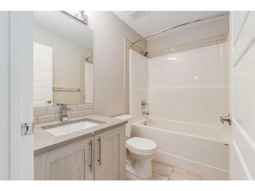 102-4350 Seton Drive Se, Calgary, AB - Indoor Photo Showing Bathroom