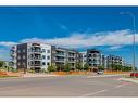 102-4350 Seton Drive Se, Calgary, AB  - Outdoor With Facade 