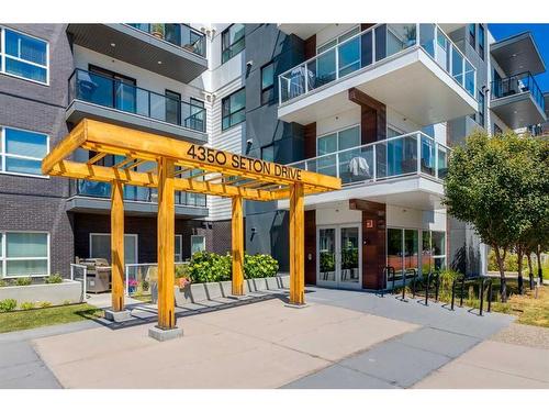 102-4350 Seton Drive Se, Calgary, AB - Outdoor With Facade