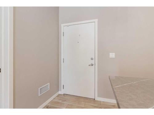 102-4350 Seton Drive Se, Calgary, AB - Indoor Photo Showing Other Room