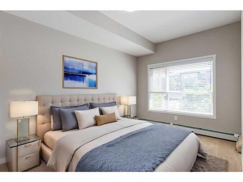 102-4350 Seton Drive Se, Calgary, AB - Indoor Photo Showing Bedroom