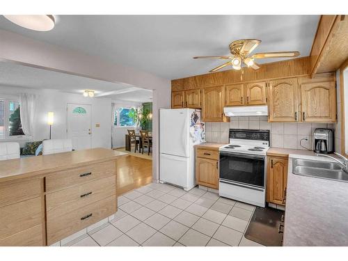 2135 54 Avenue Sw, Calgary, AB - Indoor Photo Showing Kitchen With Double Sink