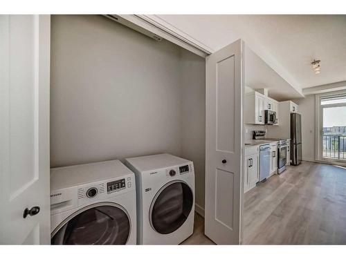 402-30 Sage Hill Walk Nw, Calgary, AB - Indoor Photo Showing Laundry Room