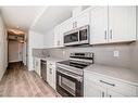 402-30 Sage Hill Walk Nw, Calgary, AB  - Indoor Photo Showing Kitchen With Stainless Steel Kitchen 