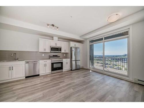 402-30 Sage Hill Walk Nw, Calgary, AB - Indoor Photo Showing Kitchen With Stainless Steel Kitchen