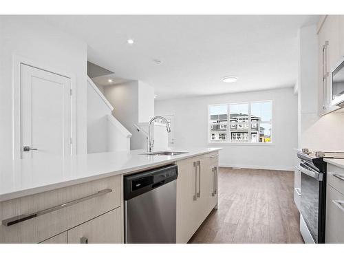 305 Dawson Way, Chestermere, AB - Indoor Photo Showing Kitchen With Upgraded Kitchen