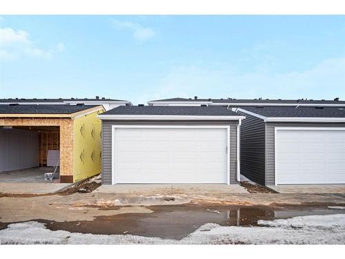 305 Dawson Way, Chestermere, AB - Outdoor With Exterior