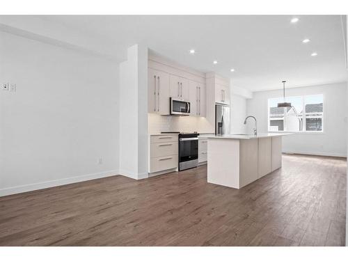 305 Dawson Way, Chestermere, AB - Indoor Photo Showing Kitchen With Upgraded Kitchen