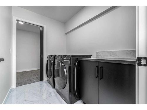 57 Legacy Woods Circle Se, Calgary, AB - Indoor Photo Showing Laundry Room