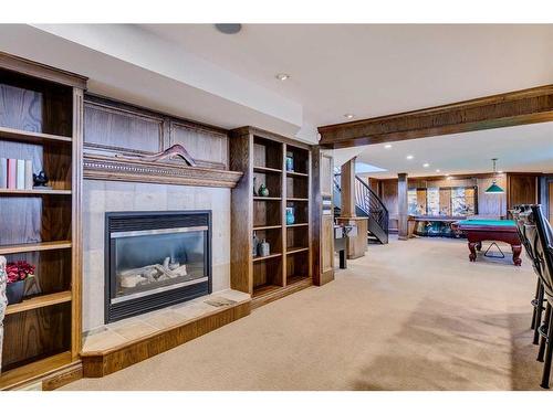 96 Woodpath Terrace Sw, Calgary, AB - Indoor With Fireplace