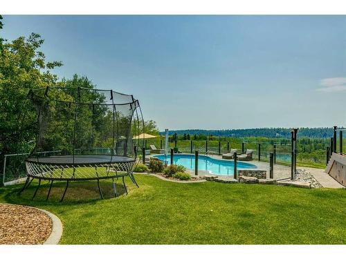 96 Woodpath Terrace Sw, Calgary, AB - Outdoor With In Ground Pool With View