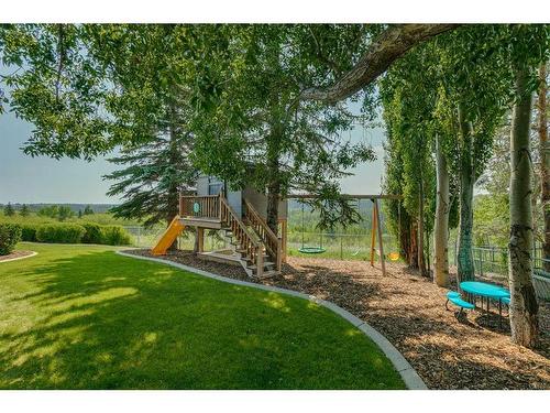 96 Woodpath Terrace Sw, Calgary, AB - Outdoor With In Ground Pool With Deck Patio Veranda With Backyard