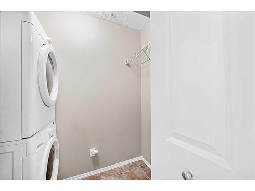 4201-1317 27 Street Se, Calgary, AB - Indoor Photo Showing Laundry Room