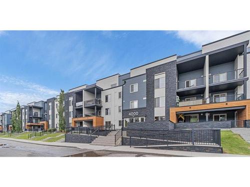 4201-1317 27 Street Se, Calgary, AB - Outdoor With Balcony With Facade