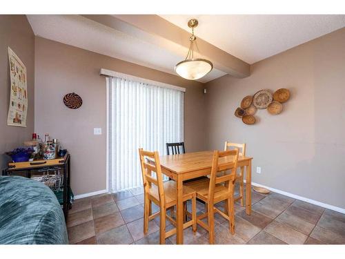 154 Bridlewood Court Sw, Calgary, AB - Indoor Photo Showing Dining Room