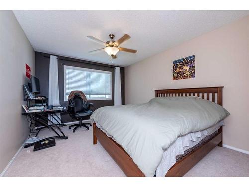 154 Bridlewood Court Sw, Calgary, AB - Indoor Photo Showing Bedroom