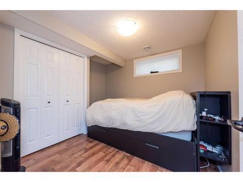 154 Bridlewood Court Sw, Calgary, AB - Indoor Photo Showing Bedroom