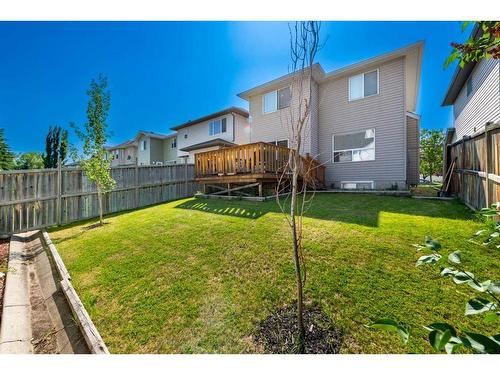 154 Bridlewood Court Sw, Calgary, AB - Outdoor With Backyard With Exterior