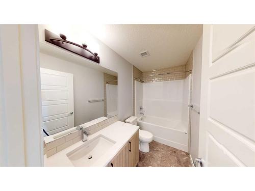 2310-220 Seton Grove Se, Calgary, AB - Indoor Photo Showing Bathroom