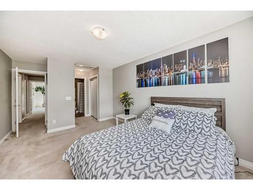 7 Cedarwood Lane Sw, Calgary, AB - Indoor Photo Showing Bedroom