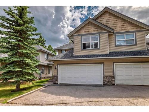 7 Cedarwood Lane Sw, Calgary, AB - Outdoor With Facade