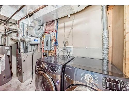 7 Cedarwood Lane Sw, Calgary, AB - Indoor Photo Showing Laundry Room