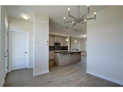 68 Shale Avenue, Cochrane, AB - Indoor Photo Showing Kitchen