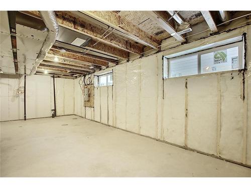 68 Shale Avenue, Cochrane, AB - Indoor Photo Showing Basement