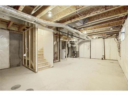 68 Shale Avenue, Cochrane, AB - Indoor Photo Showing Basement