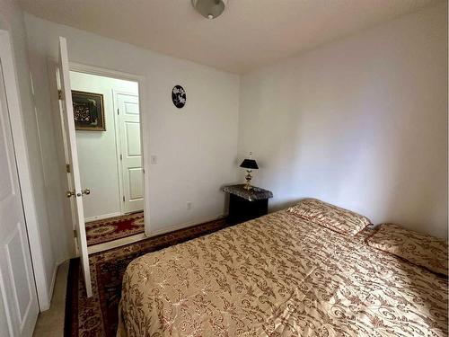 73 Taracove Road Ne, Calgary, AB - Indoor Photo Showing Bedroom