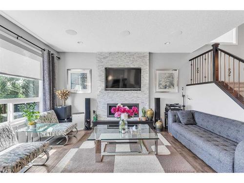 208 Panton Road Nw, Calgary, AB - Indoor Photo Showing Living Room With Fireplace