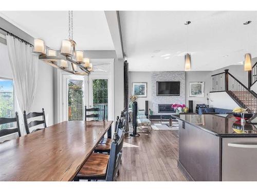 208 Panton Road Nw, Calgary, AB - Indoor Photo Showing Dining Room With Fireplace