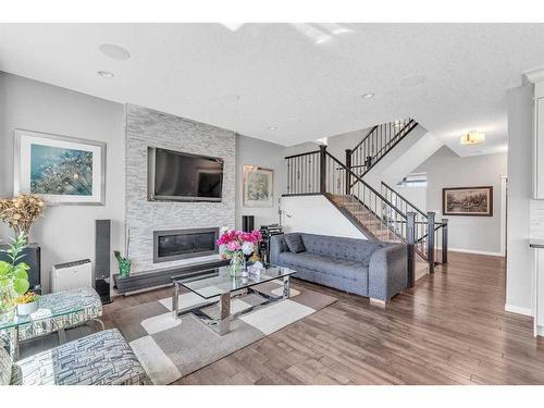 208 Panton Road Nw, Calgary, AB - Indoor Photo Showing Living Room With Fireplace