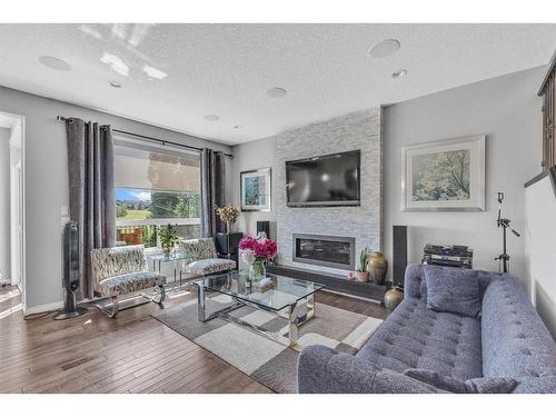 208 Panton Road Nw, Calgary, AB - Indoor Photo Showing Living Room With Fireplace