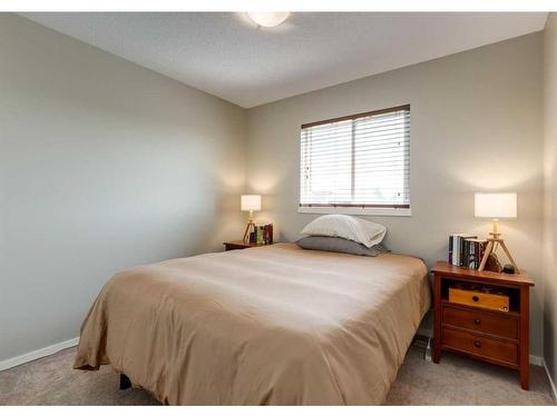 379 Silverado Drive Sw, Calgary, AB - Indoor Photo Showing Bedroom