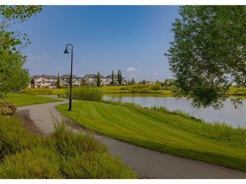 379 Silverado Drive Sw, Calgary, AB - Outdoor With Body Of Water With View