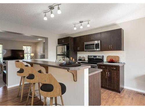 379 Silverado Drive Sw, Calgary, AB - Indoor Photo Showing Kitchen With Stainless Steel Kitchen