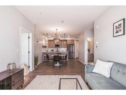 1210-220 Seton Grove Se, Calgary, AB - Indoor Photo Showing Living Room